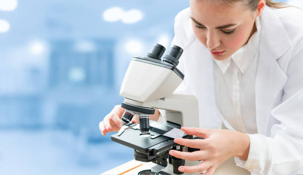 istock Scientist researcher using microscope in laboratory. Medical healthcare technology and pharmaceutical research and development concept. 1138081504