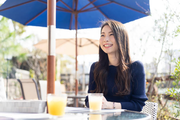 istock Woman Spending Holiday At Cafe On Open Terrace 1138085859