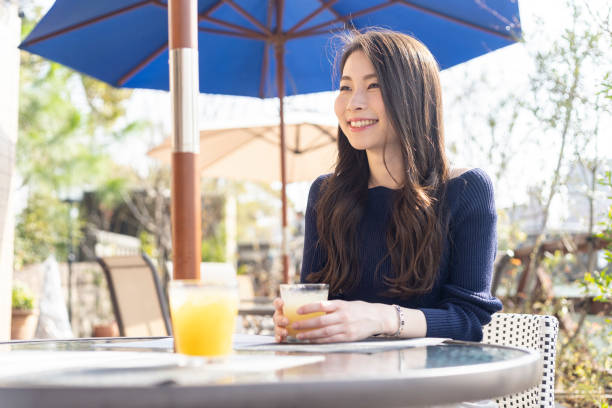 istock Woman Spending Holiday At Cafe On Open Terrace 1138085873