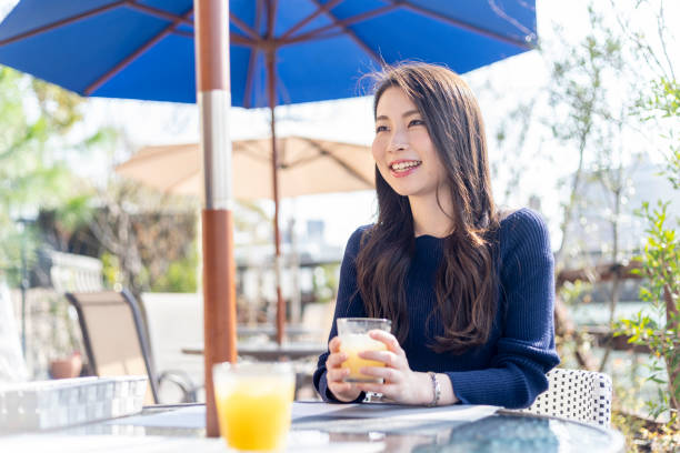 istock Woman Spending Holiday At Cafe On Open Terrace 1138085875
