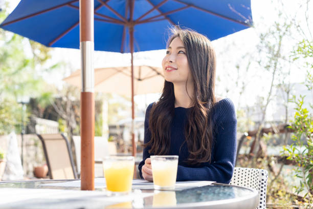 istock Woman Spending Holiday At Cafe On Open Terrace 1138085877