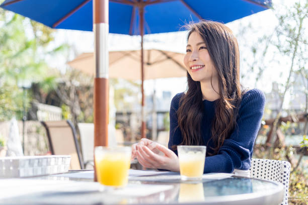 istock Woman Spending Holiday At Cafe On Open Terrace 1138085901