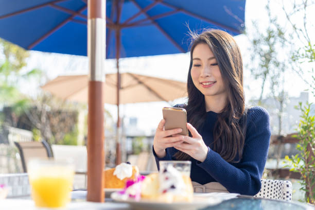 istock Woman Spending Holiday At Cafe On Open Terrace 1138085944
