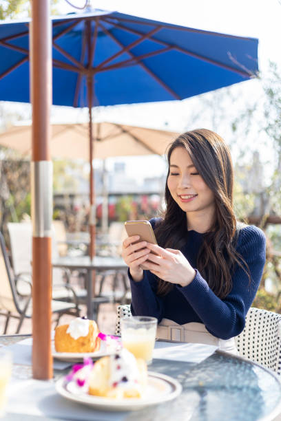 istock Woman Spending Holiday At Cafe On Open Terrace 1138085954