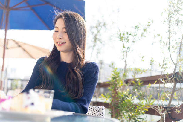 istock Woman Spending Holiday At Cafe On Open Terrace 1138085991
