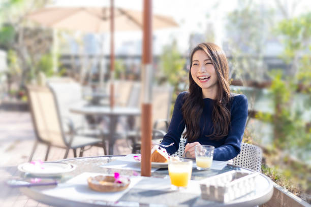 istock Woman Spending Holiday At Cafe On Open Terrace 1138085995
