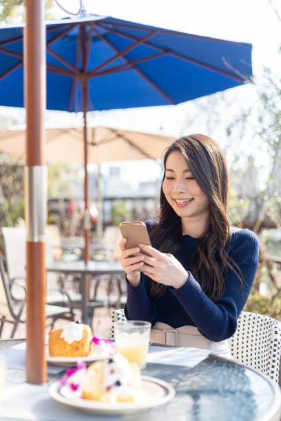istock Woman Spending Holiday At Cafe On Open Terrace 1138086000