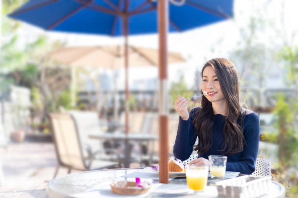 istock Woman Spending Holiday At Cafe On Open Terrace 1138086010