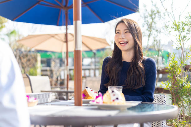 istock Woman Spending Holiday At Cafe On Open Terrace 1138086012