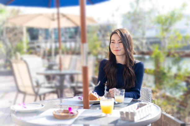 istock Woman Spending Holiday At Cafe On Open Terrace 1138086018