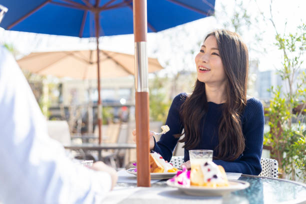 istock Woman Spending Holiday At Cafe On Open Terrace 1138086025