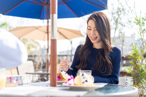 istock Woman Spending Holiday At Cafe On Open Terrace 1138086033