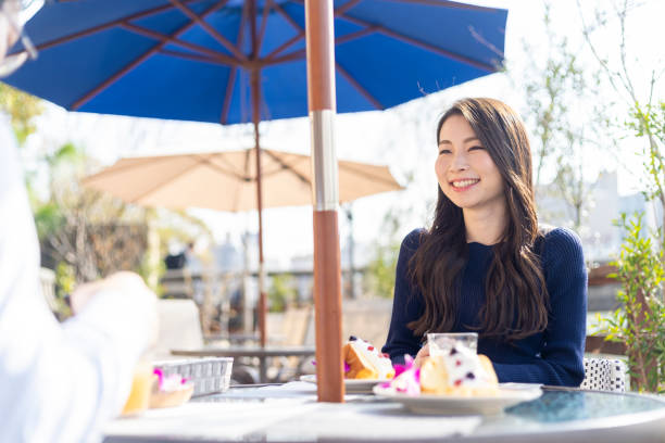 istock Woman Spending Holiday At Cafe On Open Terrace 1138086036
