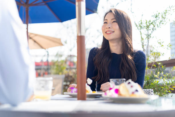 istock Woman Spending Holiday At Cafe On Open Terrace 1138086039
