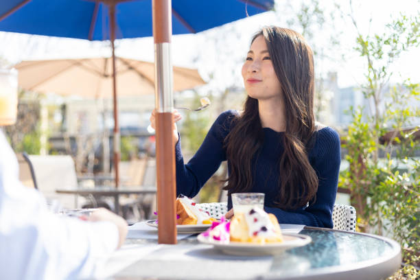 istock Woman Spending Holiday At Cafe On Open Terrace 1138086040