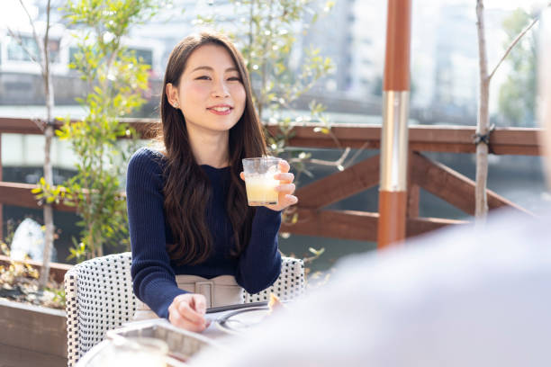 istock Woman Spending Holiday At Cafe On Open Terrace 1138086044