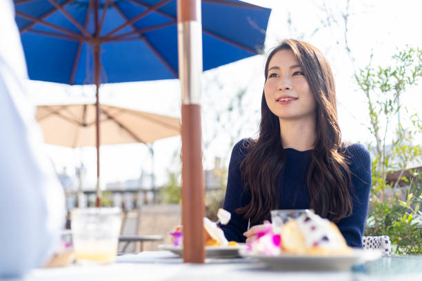 istock Woman Spending Holiday At Cafe On Open Terrace 1138086049