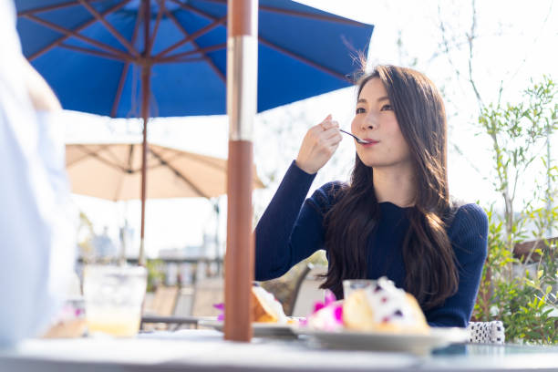 istock Woman Spending Holiday At Cafe On Open Terrace 1138086053