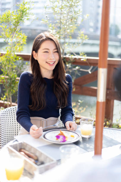 istock Woman Spending Holiday At Cafe On Open Terrace 1138086449