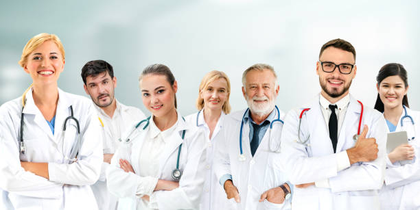 Healthcare people group. Professional doctor working in hospital office or clinic with other doctors, nurse and surgeon. Medical technology research institute and doctor staff service concept. Healthcare people group. Professional doctor working in hospital office or clinic with other doctors, nurse and surgeon. Medical technology research institute and doctor staff service concept. dv stock pictures, royalty-free photos & images
