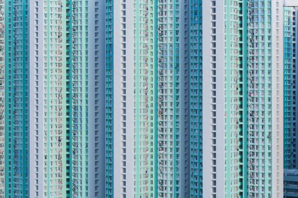 high rise residential building Exterior of public estate in Hong Kong city chinese slum stock pictures, royalty-free photos & images