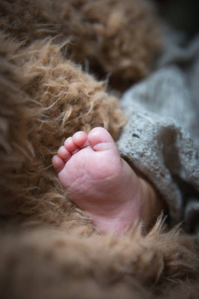 istock Newborn baby foot 1138093897