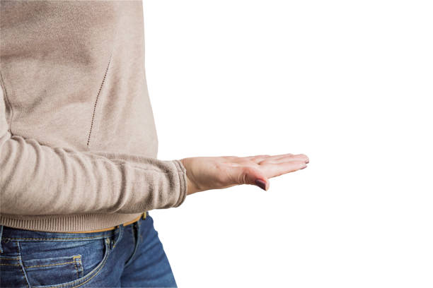 istock Empty female woman hand  showing empty copy space on the open hand palm for text, white background. 1138093945