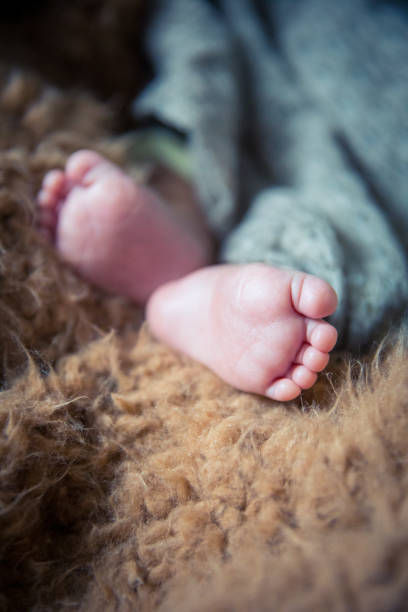 istock Newborn baby foot 1138094828