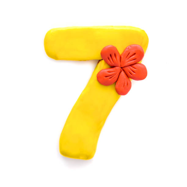 istock Number seven 7 of yellow plasticine 1138094938