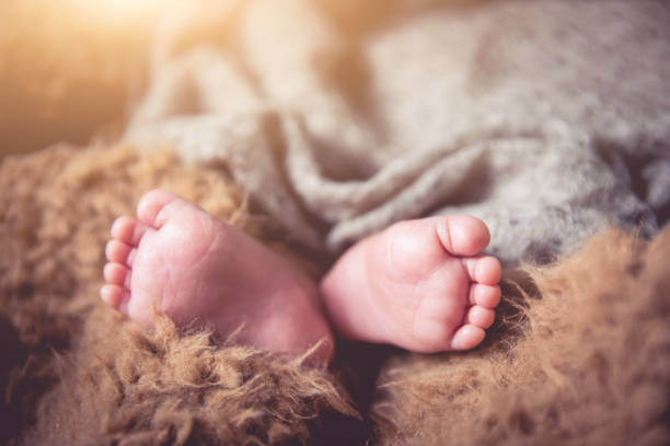 istock Newborn baby foot 1138095266