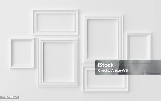 White Photoframes On White Wall With Shadows Stock Photo - Download Image Now - Frame - Border, Wall - Building Feature, Photograph