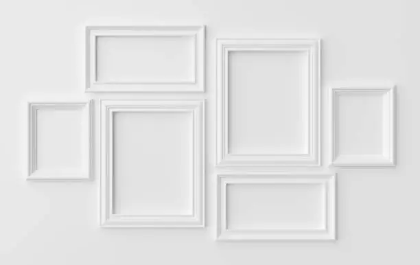 White blank photoframes on white wall with shadows, white colorless picture frames template set, photoframe mock-up 3D illustration