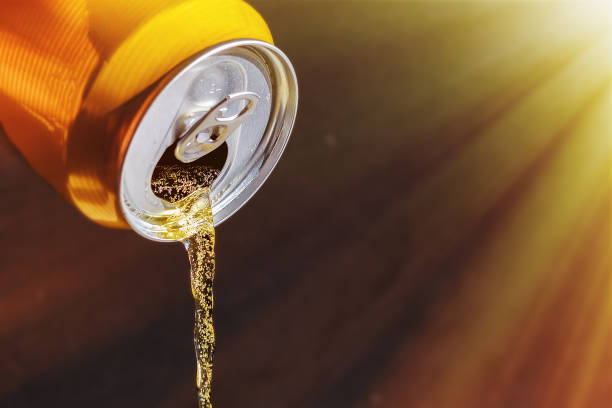 istock beer pours from the can in the sunlight 1138106711
