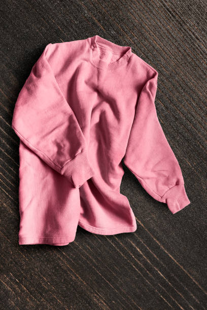 istock Sweatshirt on wooden background 1138107511
