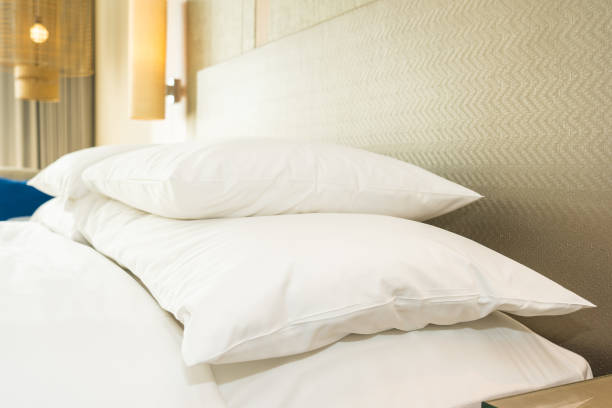 istock Beautiful comfortable pillow and blanket on bed decoration 1138110508