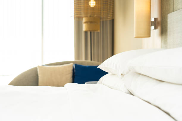 istock Beautiful comfortable pillow and blanket on bed decoration 1138110624