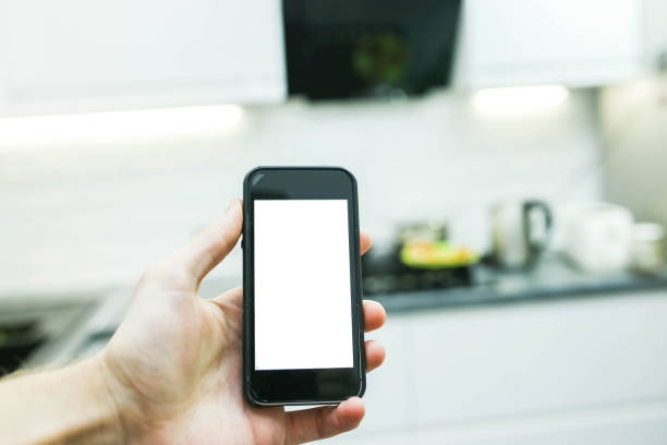 istock control of home electrical appliances through a smartphone. White screen 1138111254