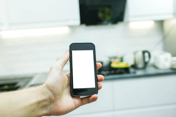 istock control of home electrical appliances through a smartphone. White screen 1138111280