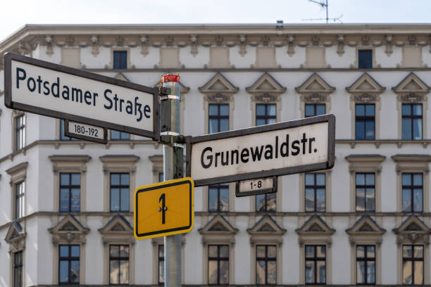 istock Street Name Sign Against Building 1138113029