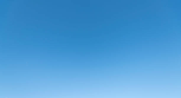 istock Close up of half moon during daylight with blue sky background, - image 1138114592