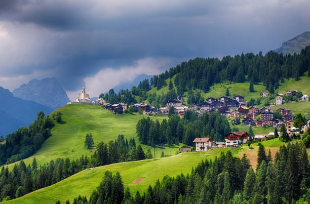 Mountain village with house in Dolomites