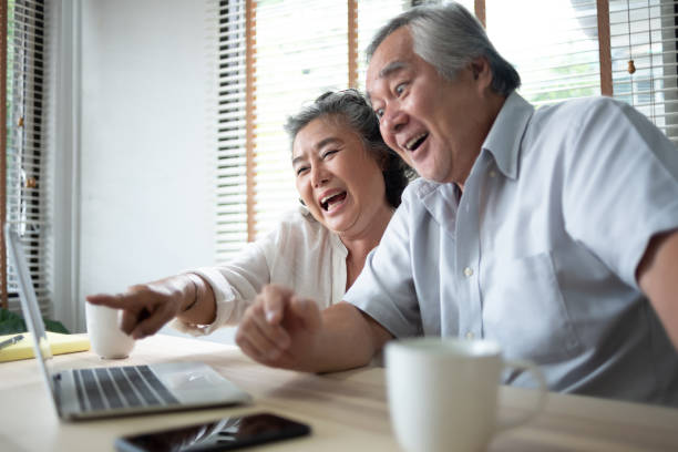 istock Happy Asian Senior couple having fun. 1138117799