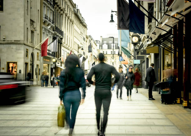 istock Motion blurred shopping couple 1138124369
