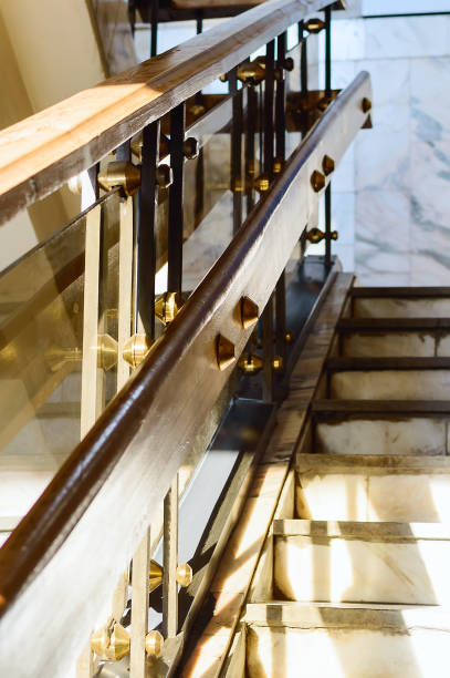 istock A fragment of an old marble staircase and a railing. 1138124526