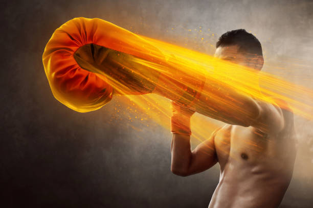 Male boxer punching Male boxer punching fist human hand punching power stock pictures, royalty-free photos & images