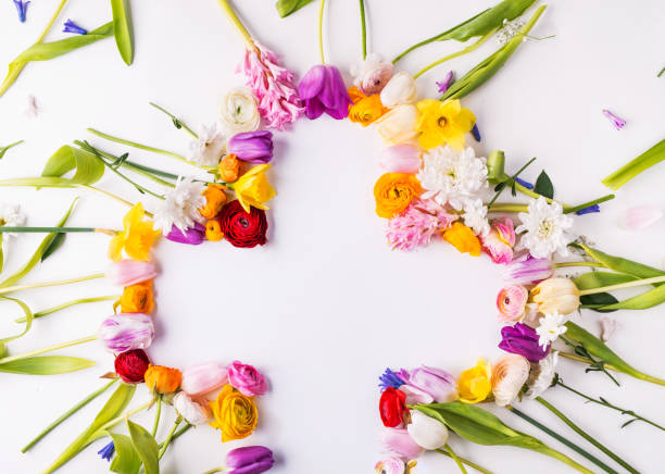 istock Flowers and cross Easter abstract concept on a white background. Copy space. 1138133390