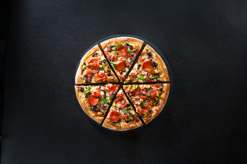 Italian pizza on dark background