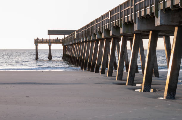 istock Fishing pier at sunrise 1138135996