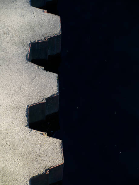 istock bulkhead looking like the teeth of a gear at the river Ruhr 1138136207