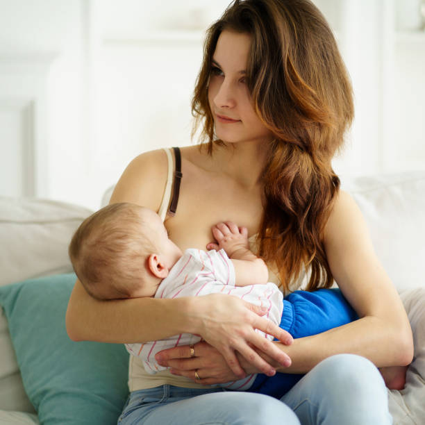 istock young mother breastfeeding her little son 1138137604